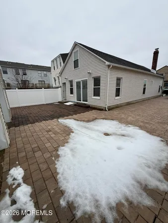 a view of a backyard of the house
