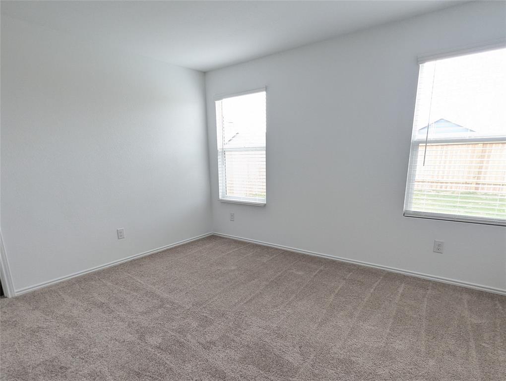 152 Avre Loop Kyle, TX 78640 - Photo 8 of 24 An inviting room offering a neutral canvas for your personal style and comfort.