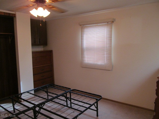 9735 Chillicothe Road, Unit 2 Willoughby, OH 44094 - Photo 42 of 49 Unfurnished bedroom featuring ornamental molding and baseboards