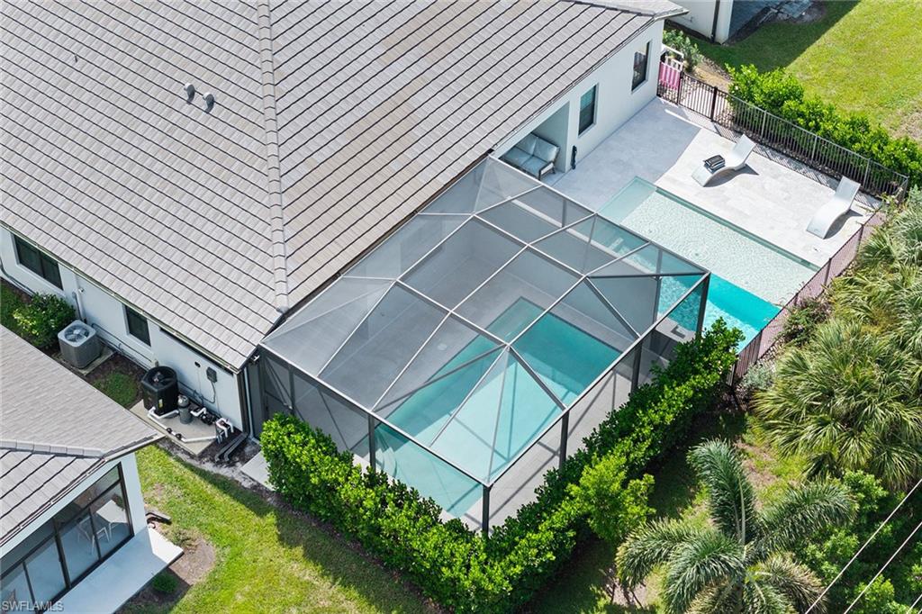 14875 Loggerhead Drive Naples, FL 34120 - Photo 25 of 28 an aerial view of a house with a yard