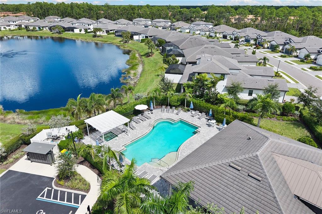 14875 Loggerhead Drive Naples, FL 34120 - Photo 27 of 28 an aerial view of a house with a lake view