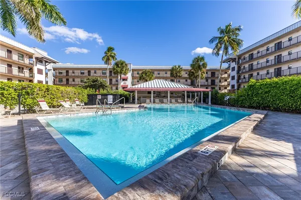 a view of a house with a swimming pool