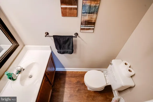 a bathroom with a toilet and a sink
