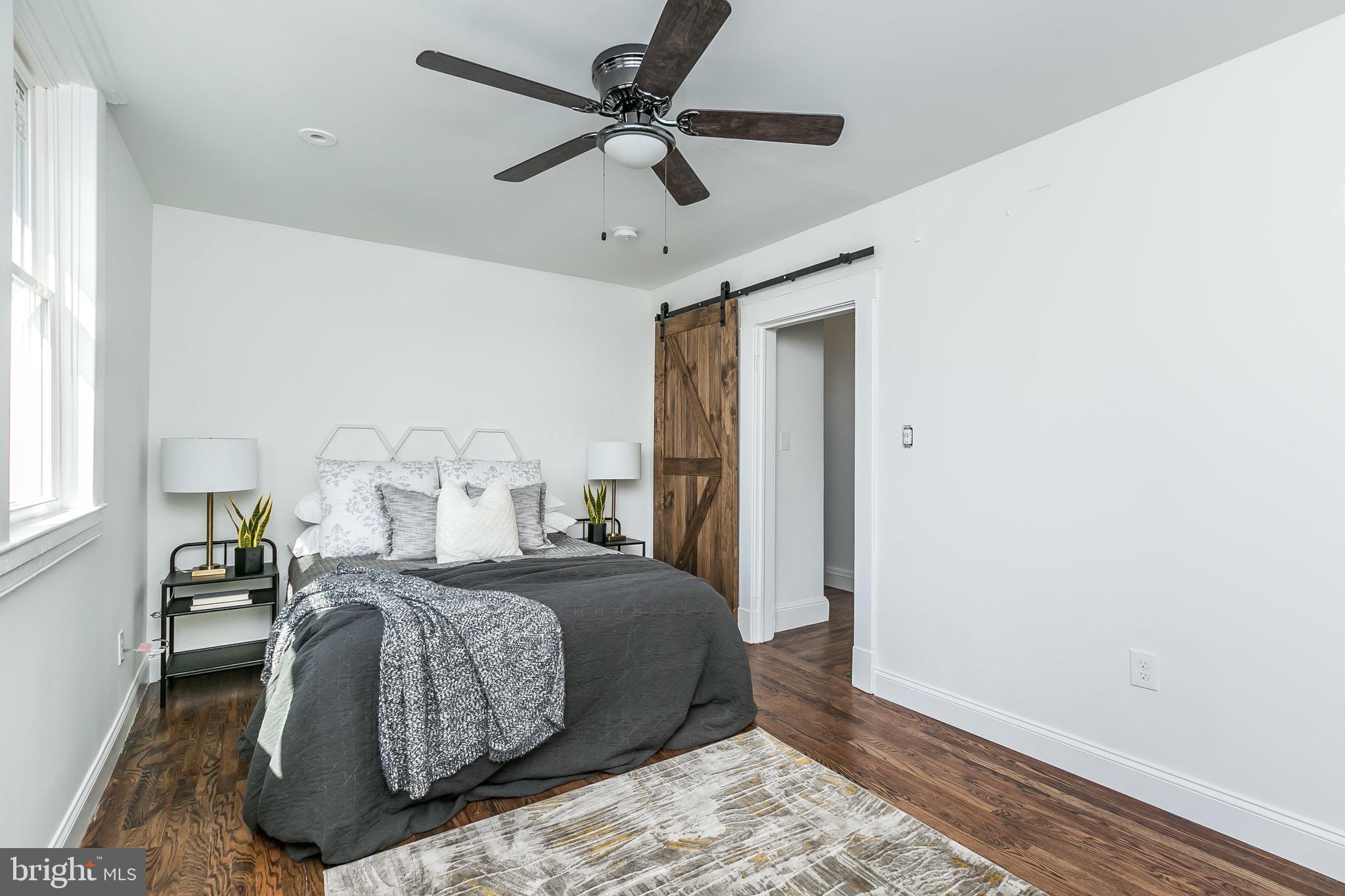 2113 Maple Road Baltimore, MD 21219 - Photo 21 of 37 Barnwood door in master bedroom