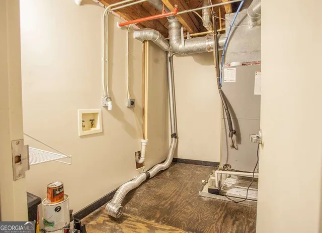 a view of a room with white walls