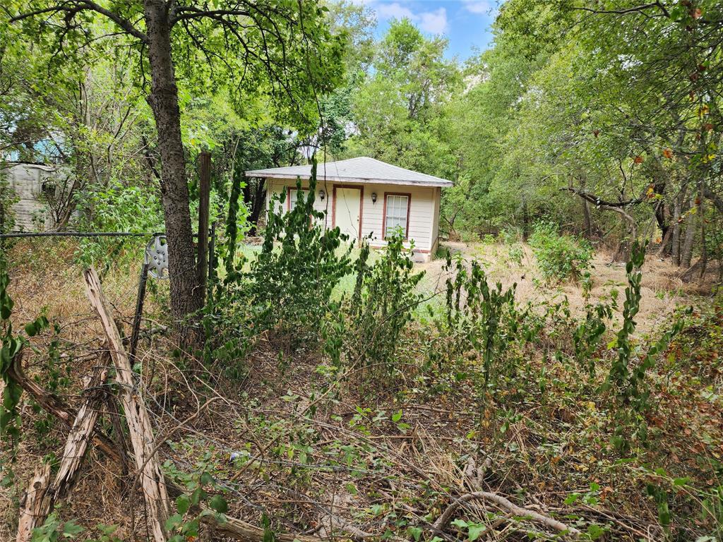 Tbd Timberline Drive Whitney, TX 76692 - Photo 4 of 11 a view of a house with a yard