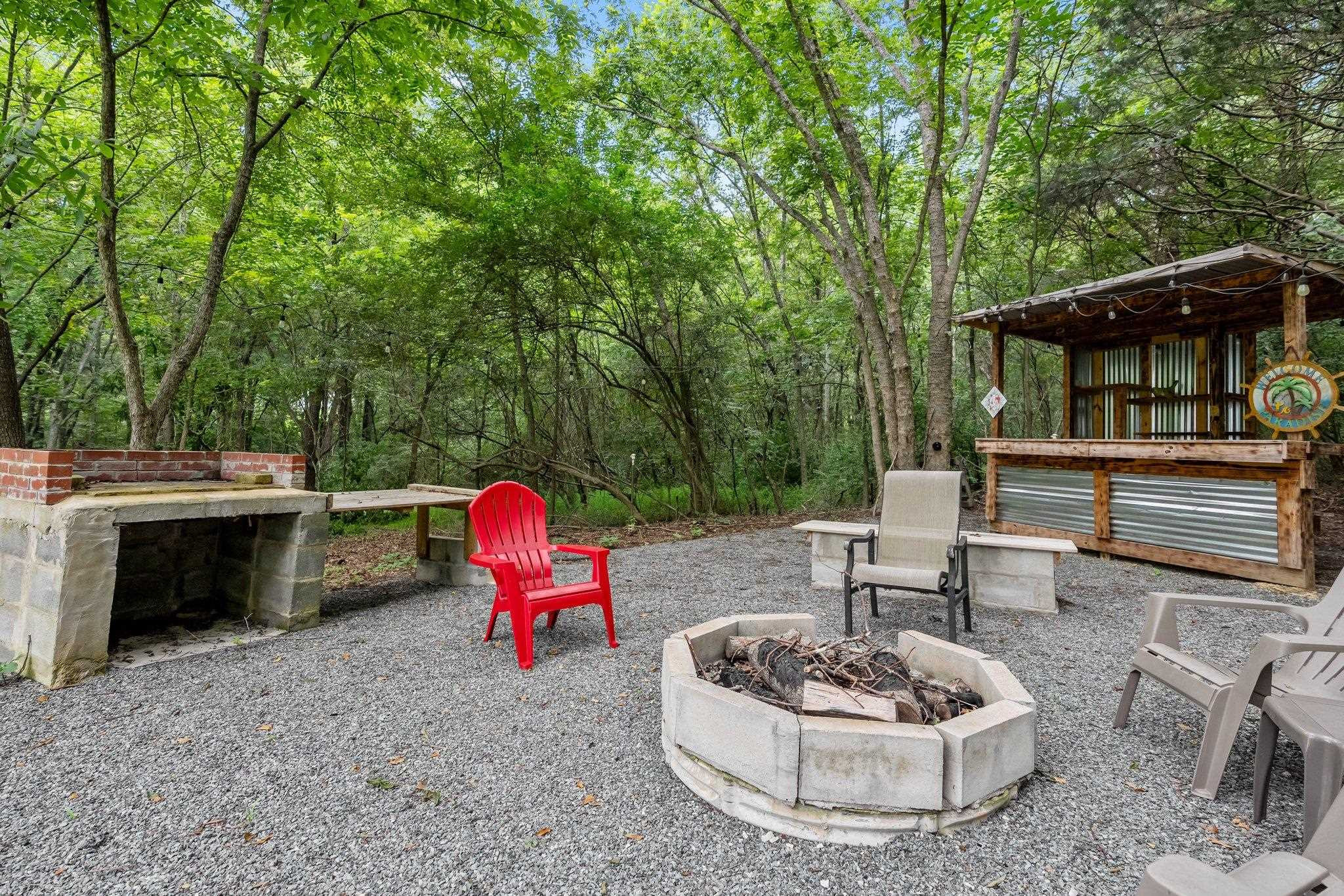 941 Bynum Road Pittsboro, NC 27312 - Photo 32 of 50 Firepit and Tiki Bar- relax and stay a while after tubing or listening to tunes at the General Store