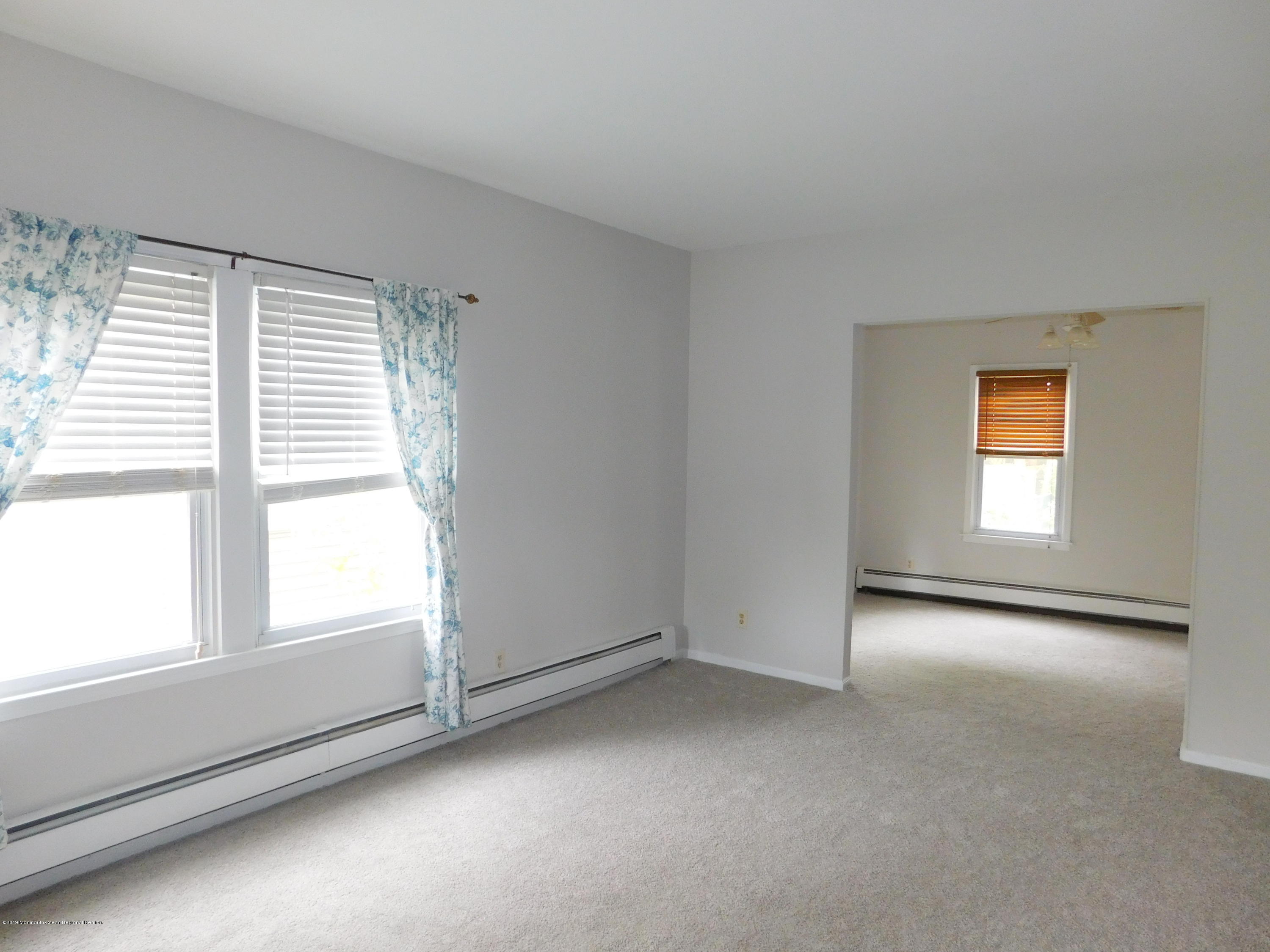 725 Oakwood Road Point Pleasant, NJ 08742 - Photo 10 of 26 Living room to Dining