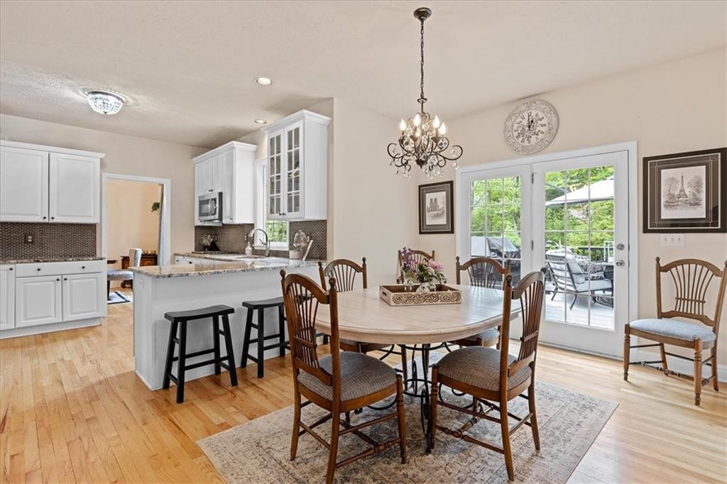 507 Sandra Lane Cheswick, PA 15024 - Photo 11 of 24 a view of a dining room with furniture window and wooden floor