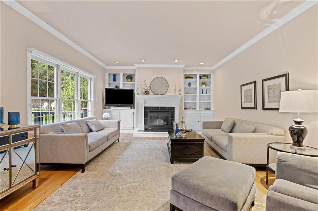 507 Sandra Lane Cheswick, PA 15024 - Photo 12 of 24 a living room with furniture large window and a fireplace