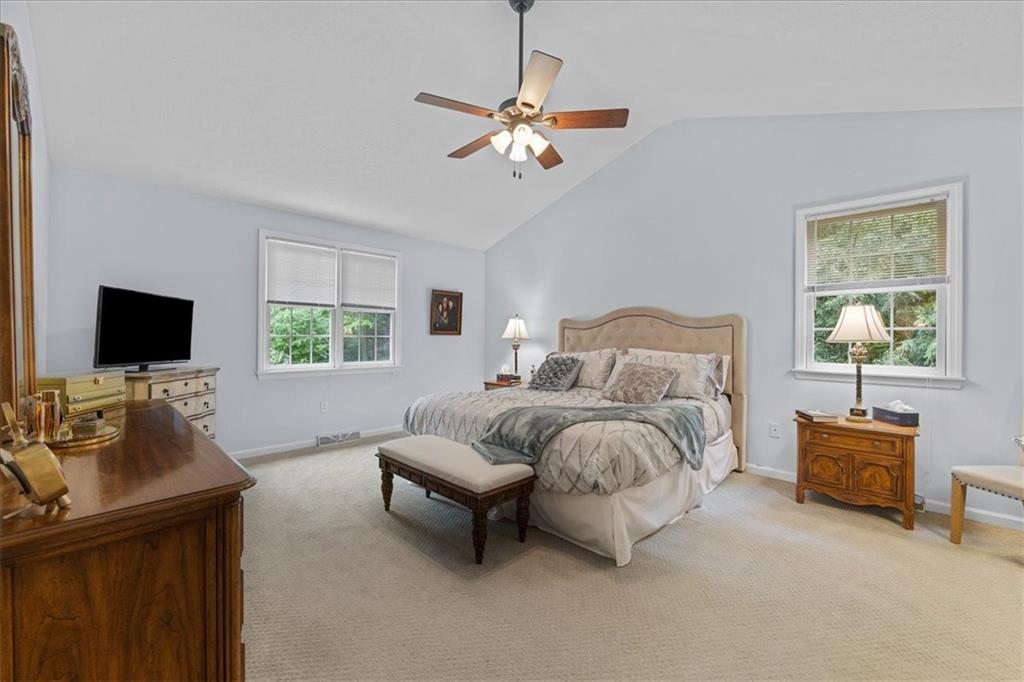507 Sandra Lane Cheswick, PA 15024 - Photo 17 of 24 a spacious bedroom with a bed and a flat screen tv