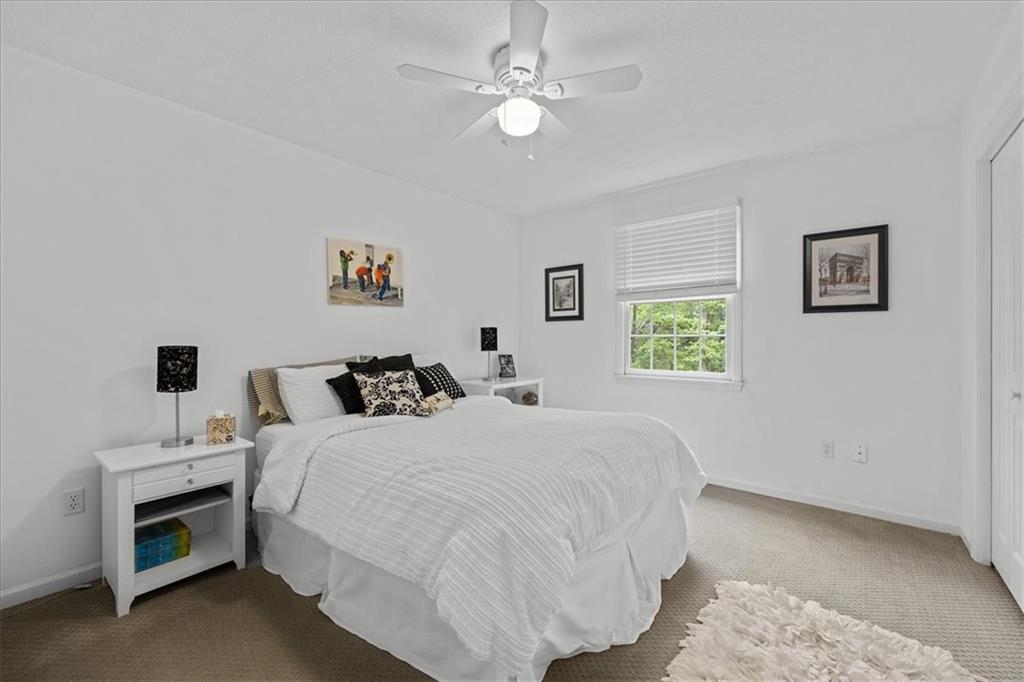 507 Sandra Lane Cheswick, PA 15024 - Photo 18 of 24 a bed room with a bed and a chandelier