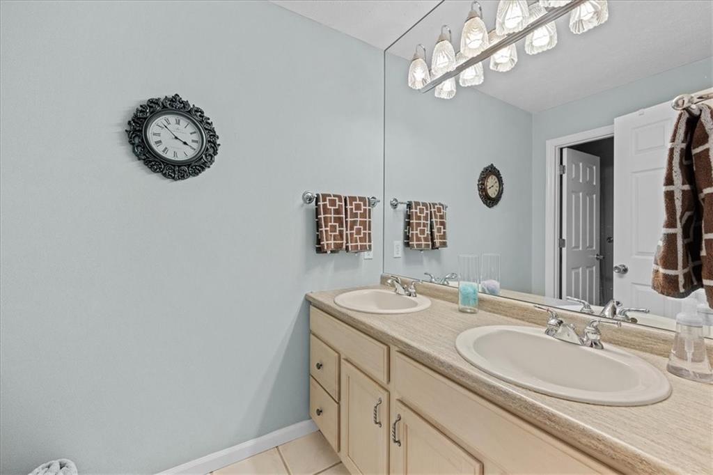 507 Sandra Lane Cheswick, PA 15024 - Photo 19 of 24 a bathroom with a sink vanity and a mirror