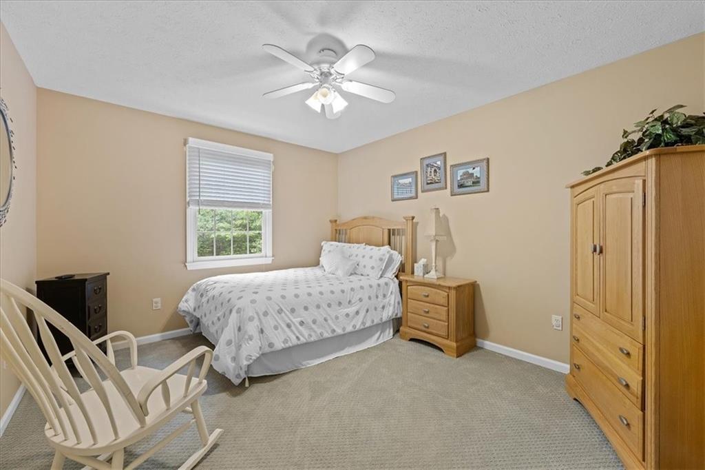 507 Sandra Lane Cheswick, PA 15024 - Photo 20 of 24 a bedroom with furniture and a window