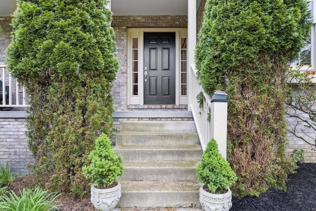 507 Sandra Lane Cheswick, PA 15024 - Photo 2 of 24 a front view of a house with plants