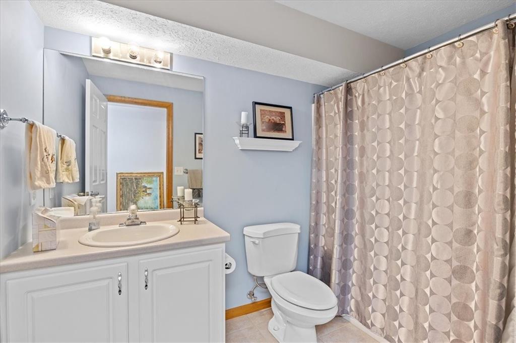 507 Sandra Lane Cheswick, PA 15024 - Photo 23 of 24 a bathroom with a toilet a sink and a mirror
