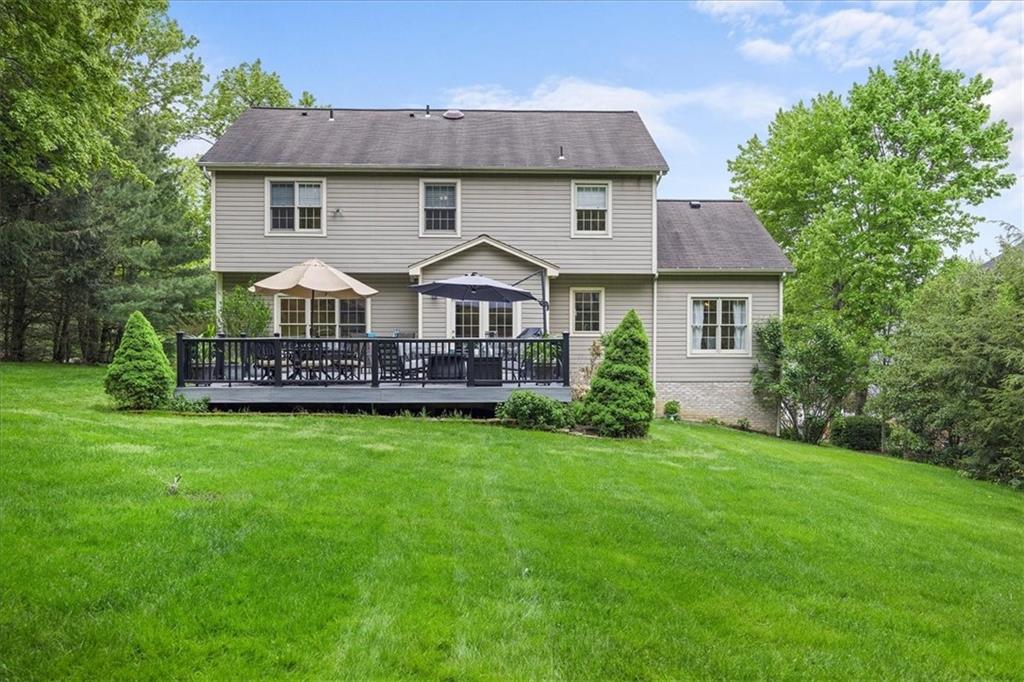 507 Sandra Lane Cheswick, PA 15024 - Photo 3 of 24 a view of a house with a yard and deck