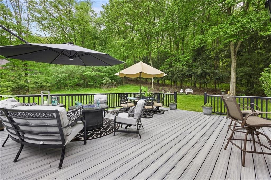 507 Sandra Lane Cheswick, PA 15024 - Photo 5 of 24 a view of a chairs and table on the wooden deck