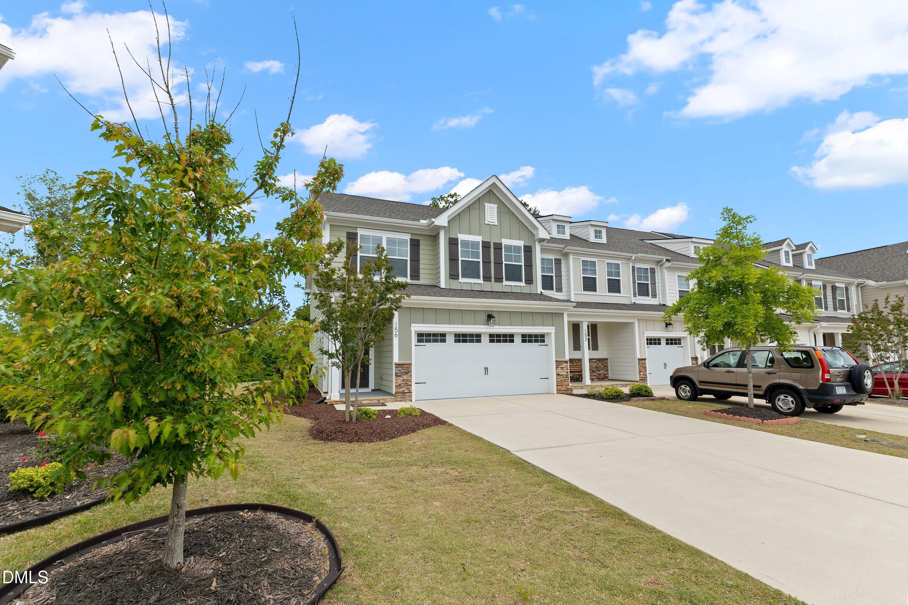 156 Sears Ridge Lane Morrisville, NC 27560 - Photo 2 of 49 a view of street with parked cars
