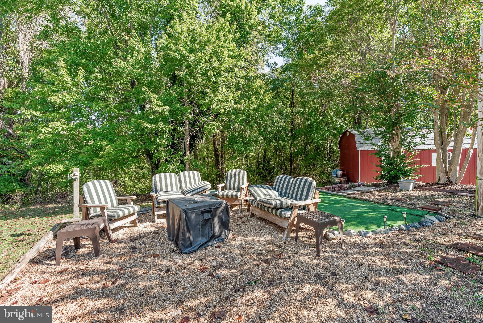 9235 Pardoe Road Lusby, MD 20657 - Photo 22 of 28 Nice firepit area to enjoy with family and friends