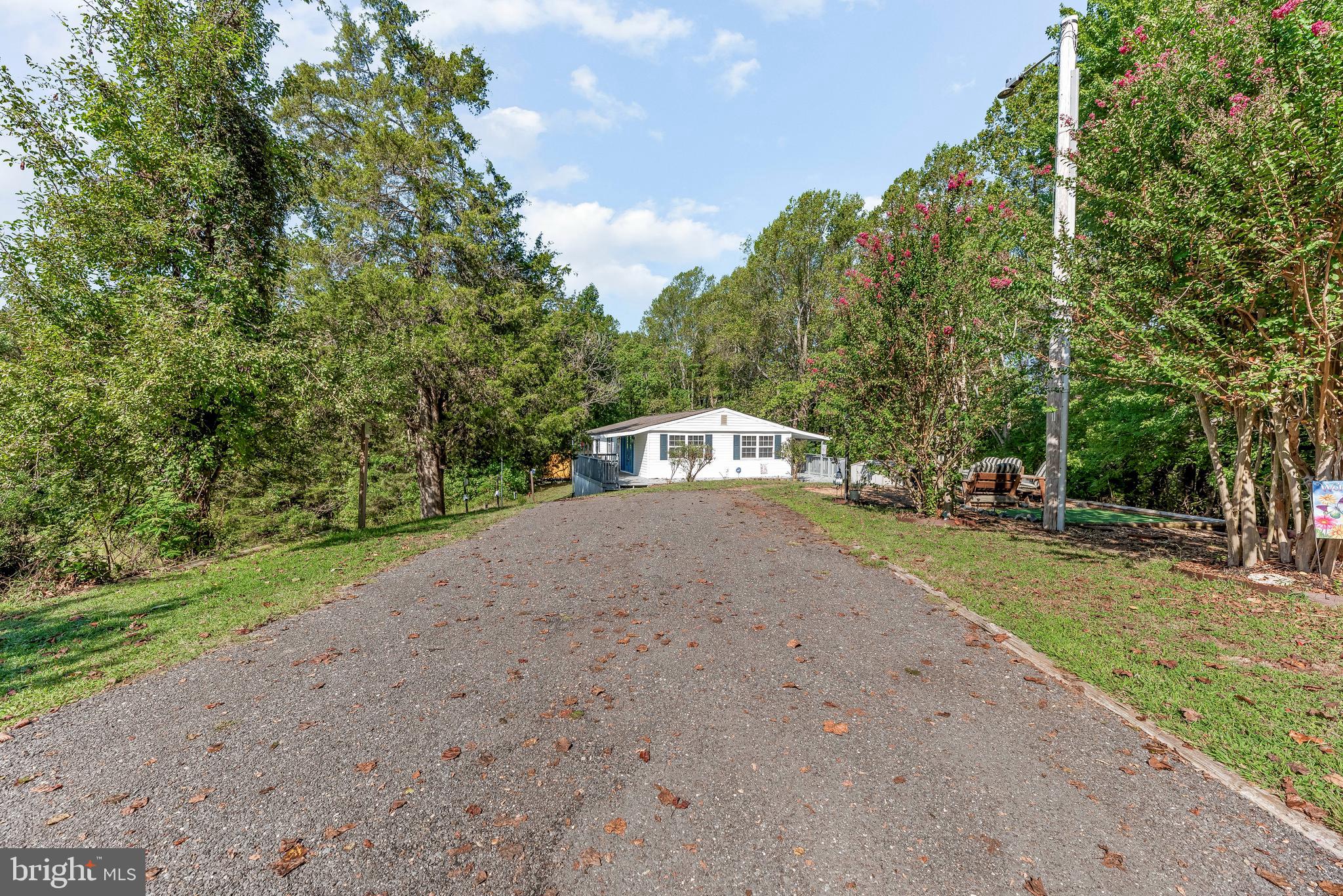 9235 Pardoe Road Lusby, MD 20657 - Photo 3 of 28 Plenty of parking for your RV, boat, and cars.