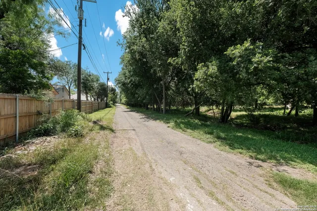 a view of backyard with green space