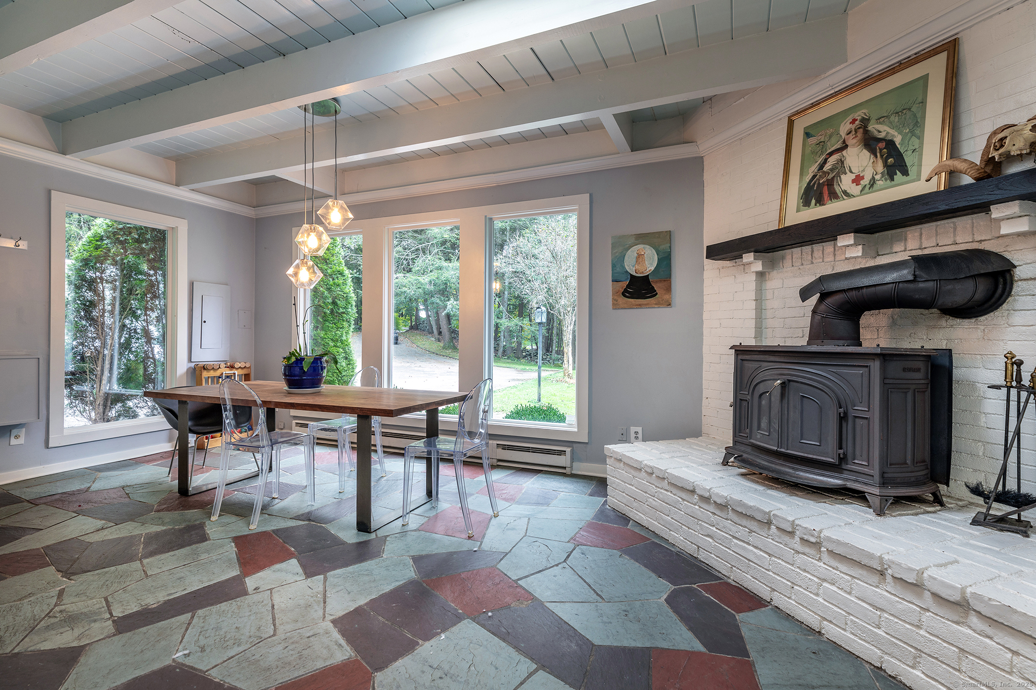 116 Wellers Bridge Road Roxbury, CT 06783 - Photo 11 of 25 a living room with furniture a window and a fireplace
