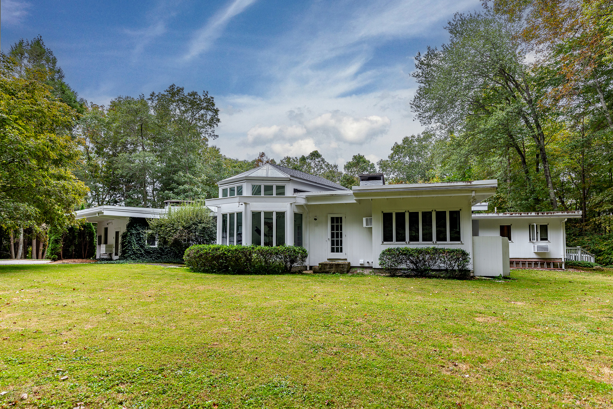 116 Wellers Bridge Road Roxbury, CT 06783 - Photo 20 of 25 a front view of a house with garden