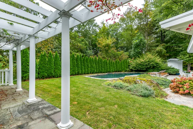 a view of a backyard with garden