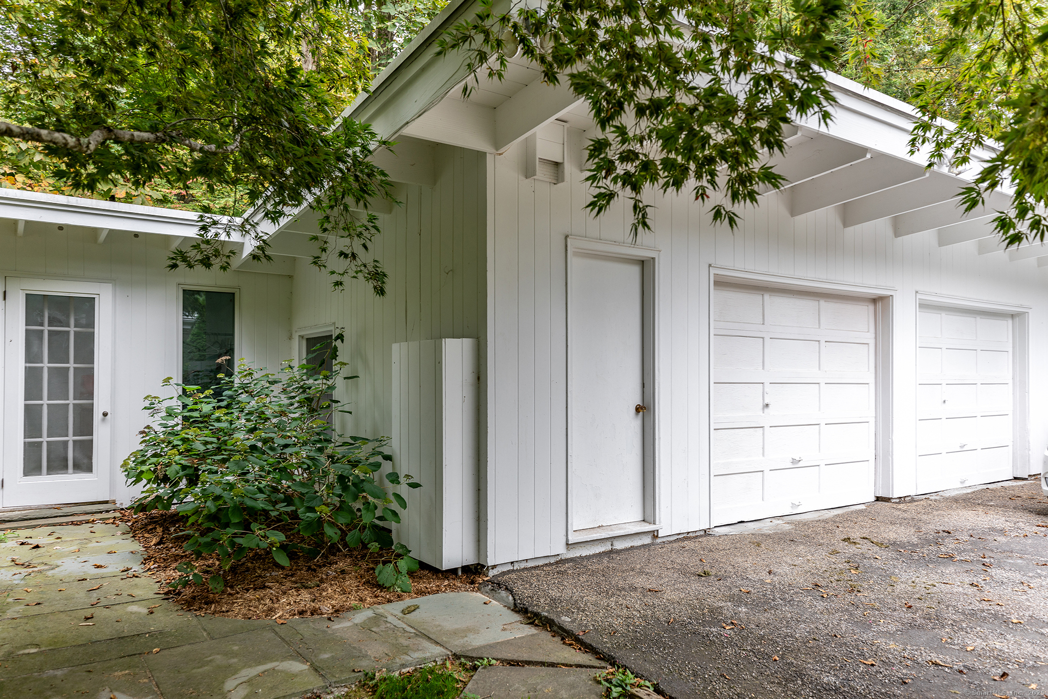 116 Wellers Bridge Road Roxbury, CT 06783 - Photo 25 of 25 a front view of a house with a tree