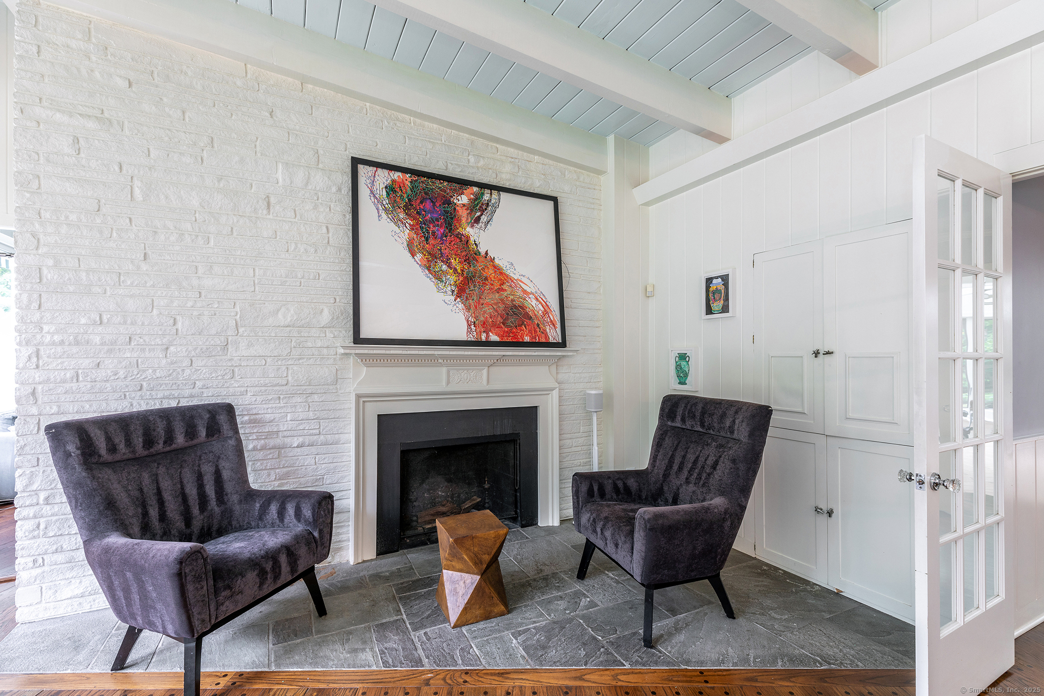 116 Wellers Bridge Road Roxbury, CT 06783 - Photo 5 of 25 a living room with furniture and a fireplace