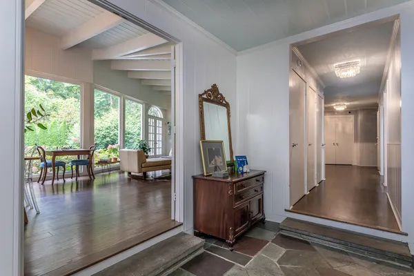a lobby with furniture and window