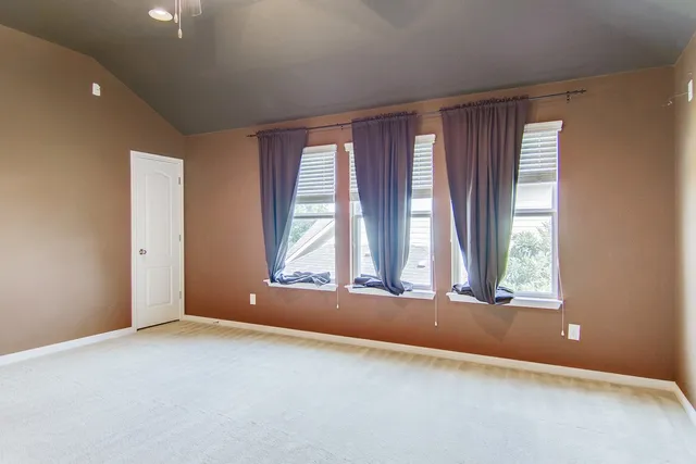 a view of a bathroom from a hallway