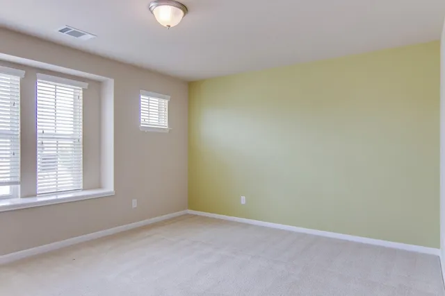 a bathroom with a sink a mirror and a shower
