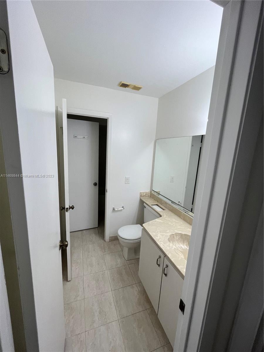 The Crossings Miami, FL 33186 - Photo 1 of 14 a bathroom with a granite countertop sink toilet and shower