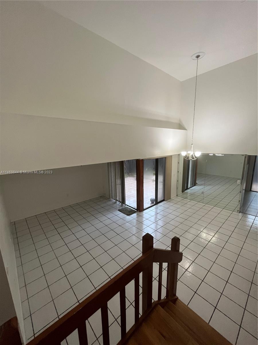 The Crossings Miami, FL 33186 - Photo 8 of 14 a view of a hallway with seating area