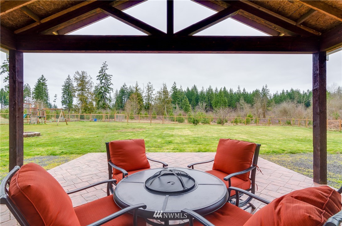 243 Gartner Road Winlock, WA 98596 - Photo 27 of 38 a outdoor sitting area with furniture and a garden