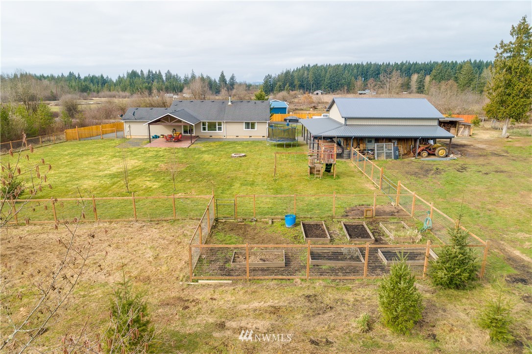 243 Gartner Road Winlock, WA 98596 - Photo 34 of 38 a view of a swimming pool with an ocean view