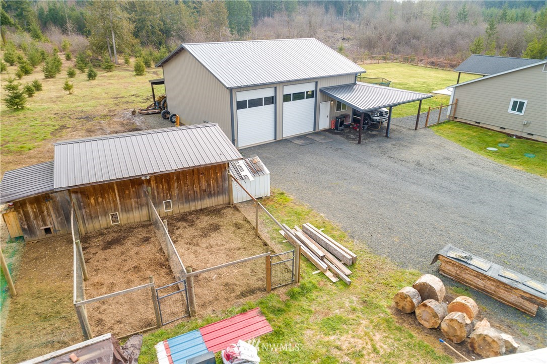 243 Gartner Road Winlock, WA 98596 - Photo 35 of 38 a view of a patio with table and chairs near an ocean