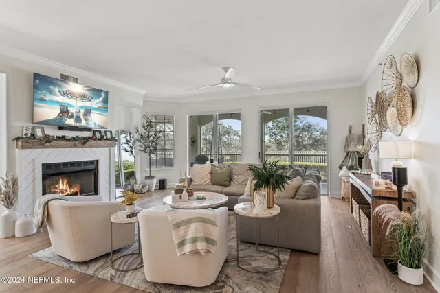 a bedroom with a large bed and a large window