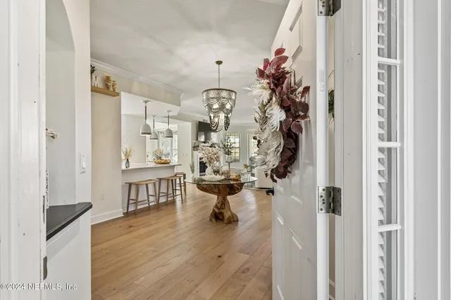 a view of bathroom with furniture and wooden floor