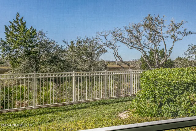 a view of a lake with a city