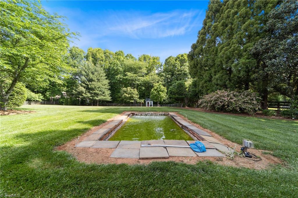 5806 Billet Road Oak Ridge, NC 27310 - Photo 36 of 46 THERE'S EVEN A SMALL FISH POND IN THE REAR YARD