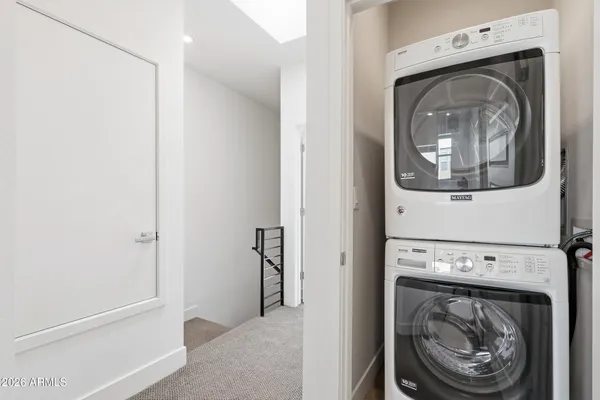 a utility room with a washer and dryer