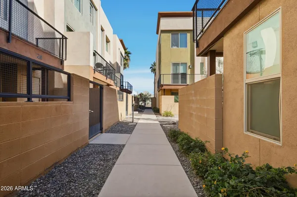 a view of a backyard with sitting area