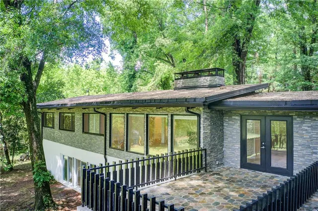 a view of a house with a large window