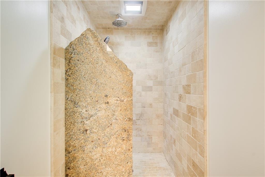 1676 Moores Mill Road Northwest Atlanta, GA 30327 - Photo 20 of 32 a bathroom with a shower