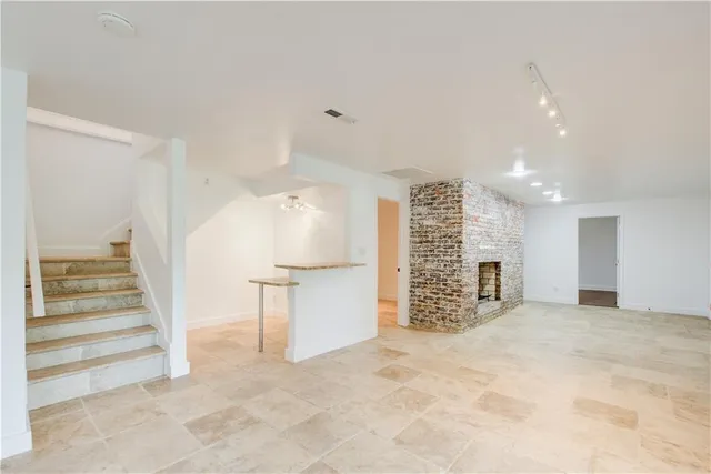 a view of a room with window and closet