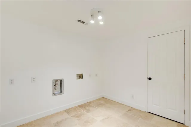 a view of an empty room with a balcony