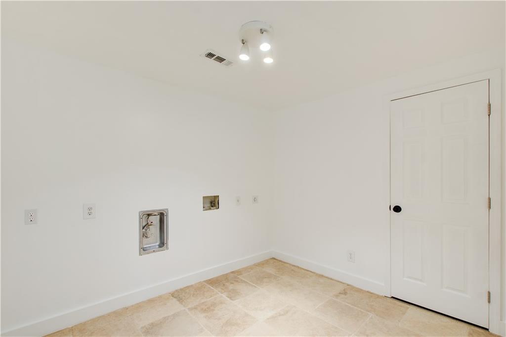 1676 Moores Mill Road Northwest Atlanta, GA 30327 - Photo 24 of 32 a view of a room with window and closet